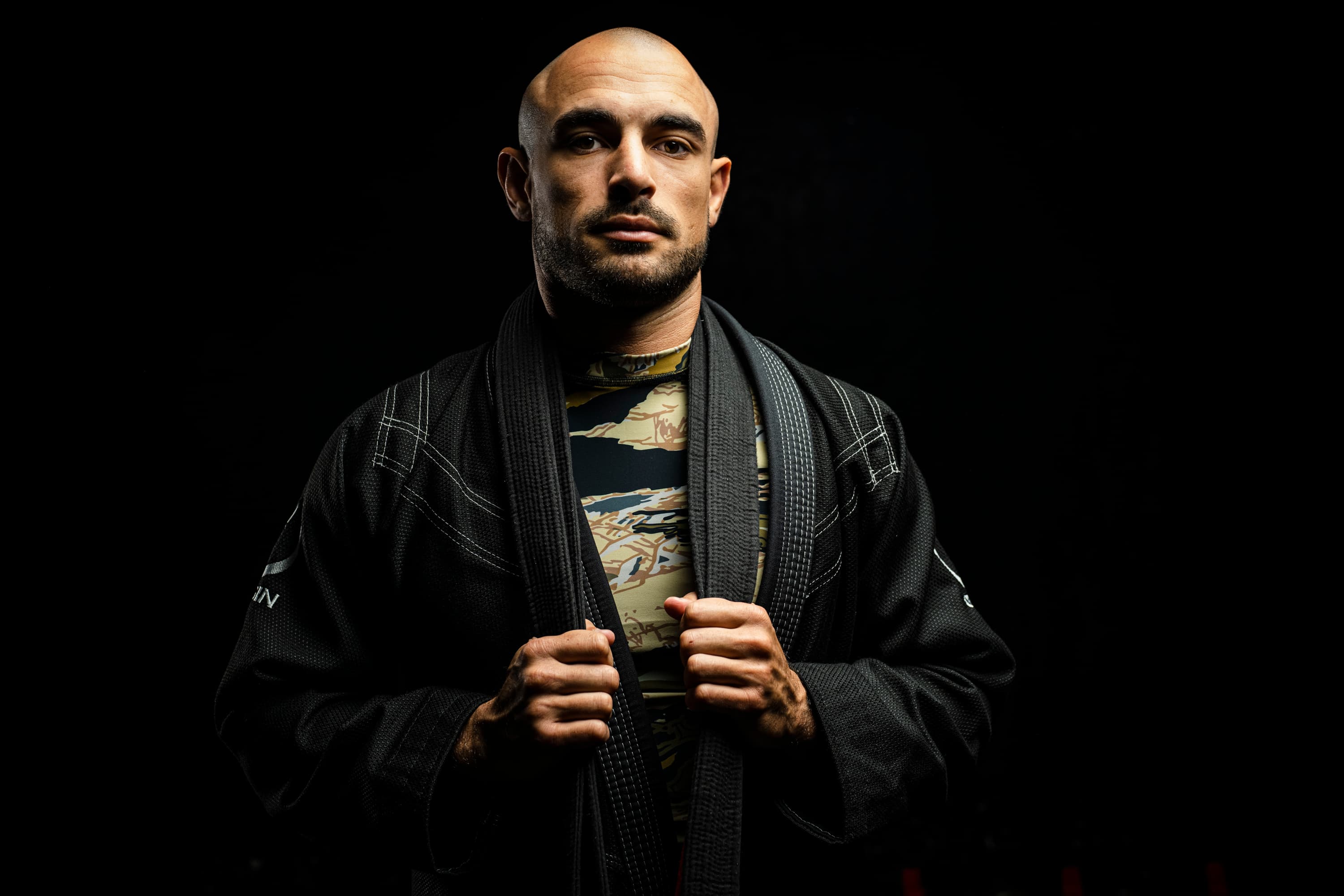 Neo founder standing in a black gi